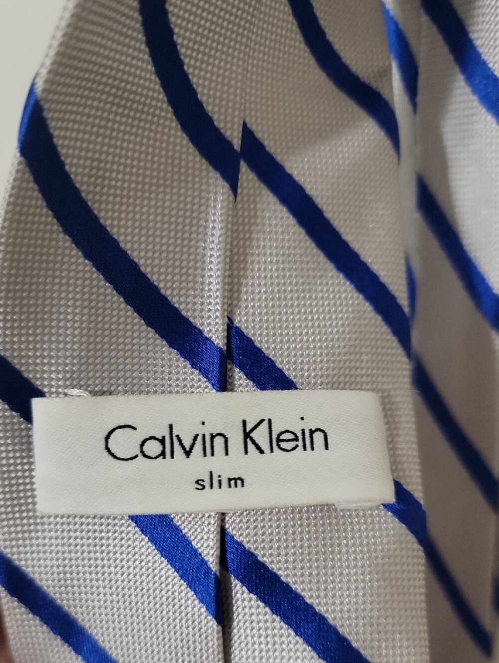 Calvin Klein Silver Tie with Blue Stripes